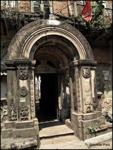 ornate heritage gateway in old building in Jorasanko Kolkata