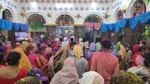 Devotees congregate at the Dhameswar Mahaprabhu temple dol celebrations in Nabadwip