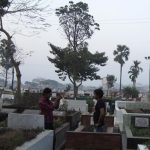 photos in a graveyard in Dhaka